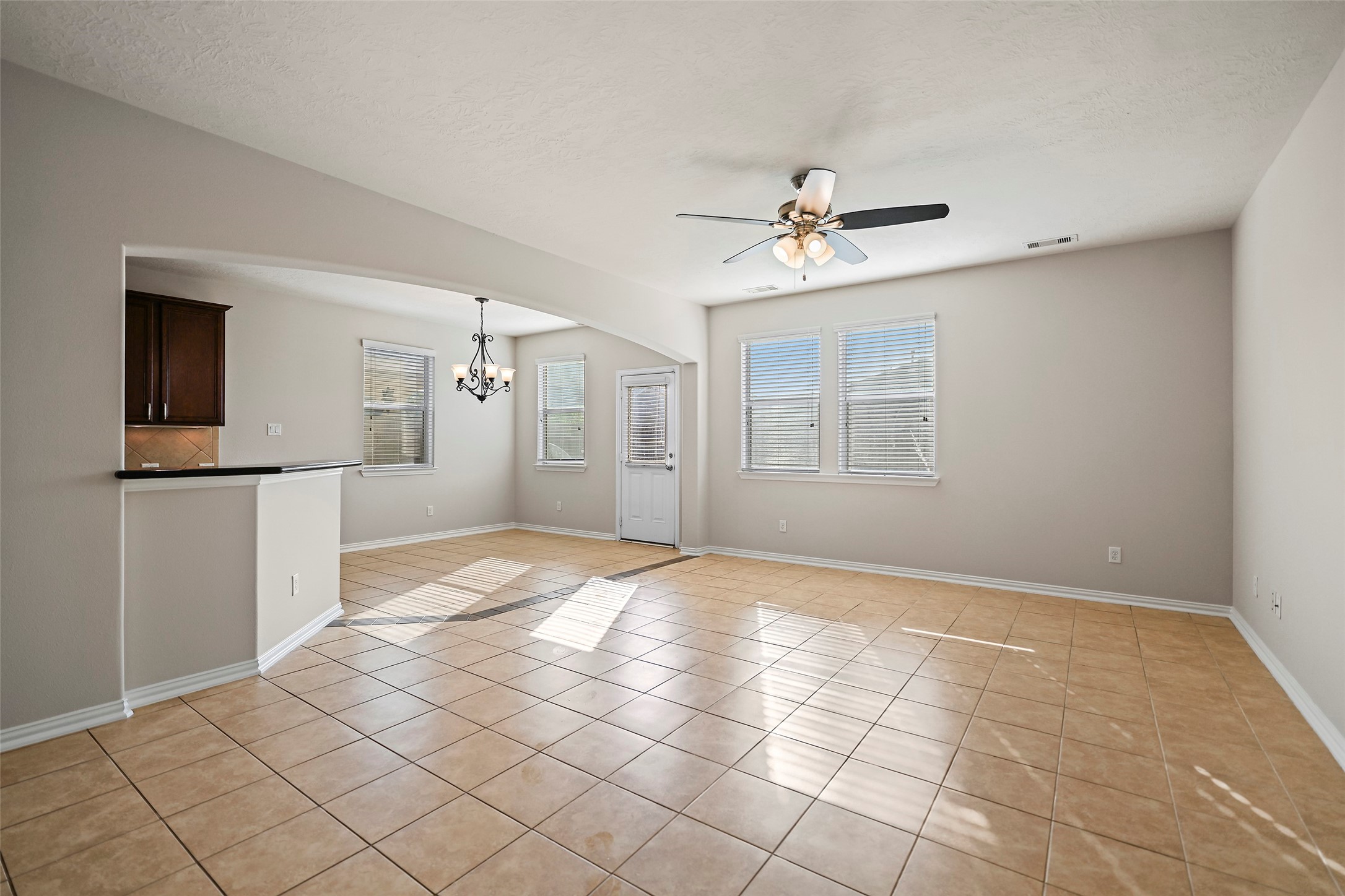 8323 Rudy Brook Way Spring, TX 77379 - Photo 7 of 35 a view of an empty room with a window