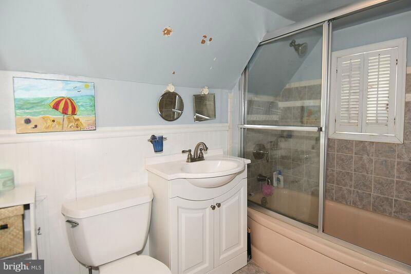 306 Indian Spring Drive Silver Spring, MD 20901 - Photo 23 of 30 a bathroom with a sink a toilet and shower