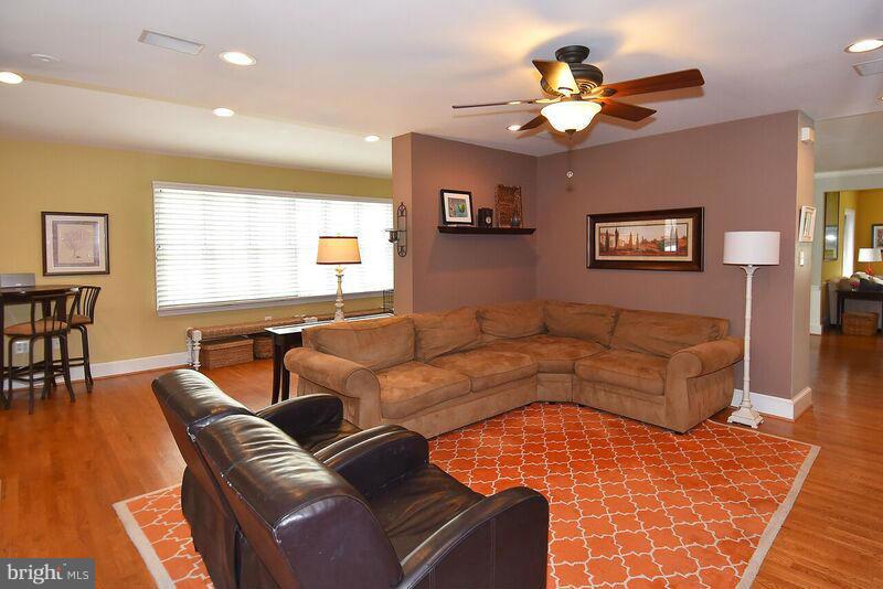 306 Indian Spring Drive Silver Spring, MD 20901 - Photo 4 of 30 a living room with furniture ceiling fan and a window
