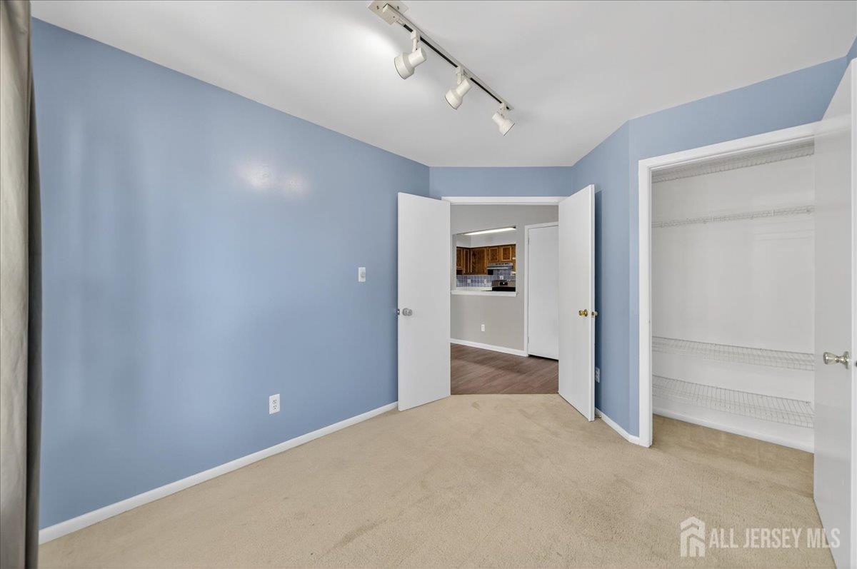 306 Trinity Court, Unit 12 Princeton, NJ 08540 - Photo 9 of 26 a view of a hallway