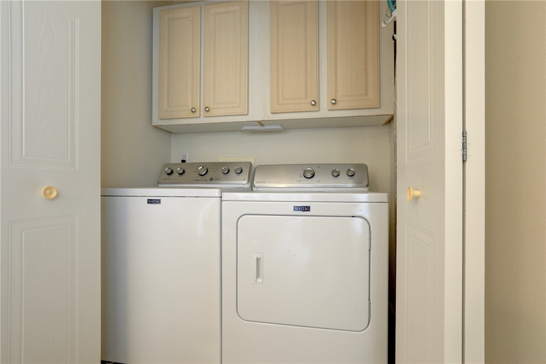 362 Egret Circle Barefoot Bay, FL 32976 - Photo 24 of 36 a utility room with dryer and washer