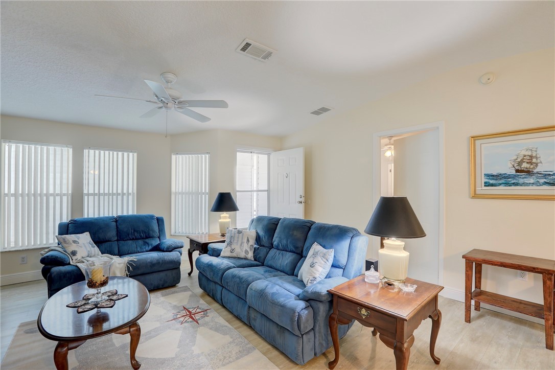 362 Egret Circle Barefoot Bay, FL 32976 - Photo 5 of 36 a living room with furniture