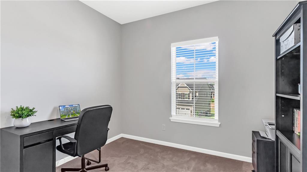 4204 Spruce Road Gibsonia, PA 15044 - Photo 11 of 22 a view of a workspace with furniture and a window