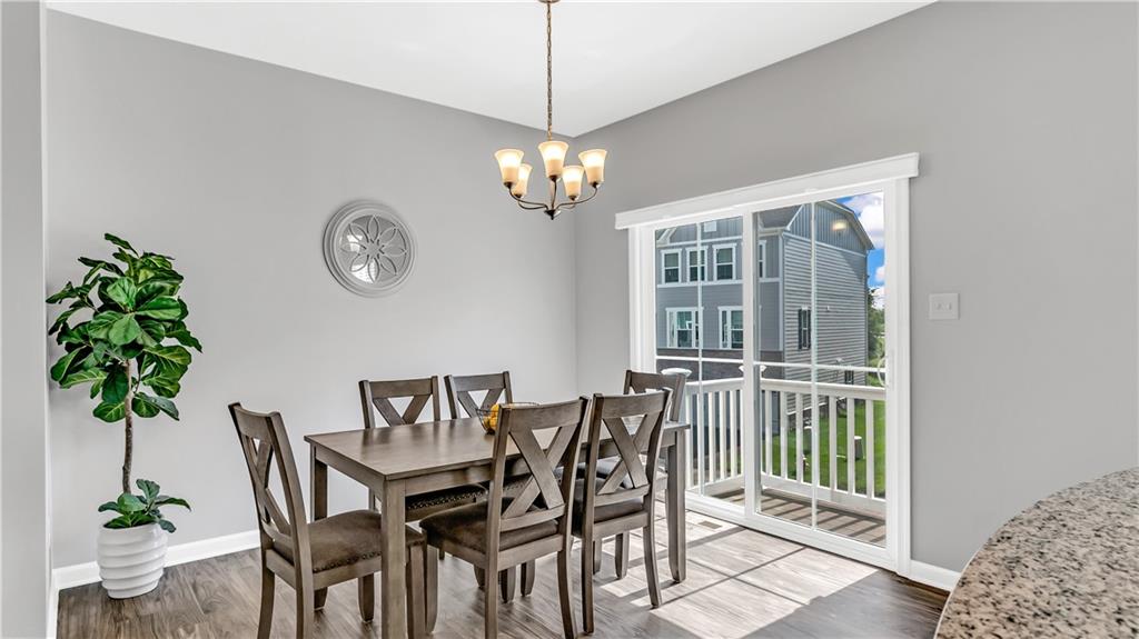 4204 Spruce Road Gibsonia, PA 15044 - Photo 5 of 22 a view of a dining room with furniture window and wooden floor