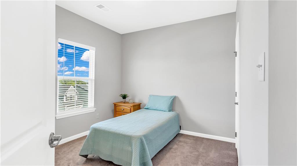 4204 Spruce Road Gibsonia, PA 15044 - Photo 10 of 22 a bedroom with a bed and a window