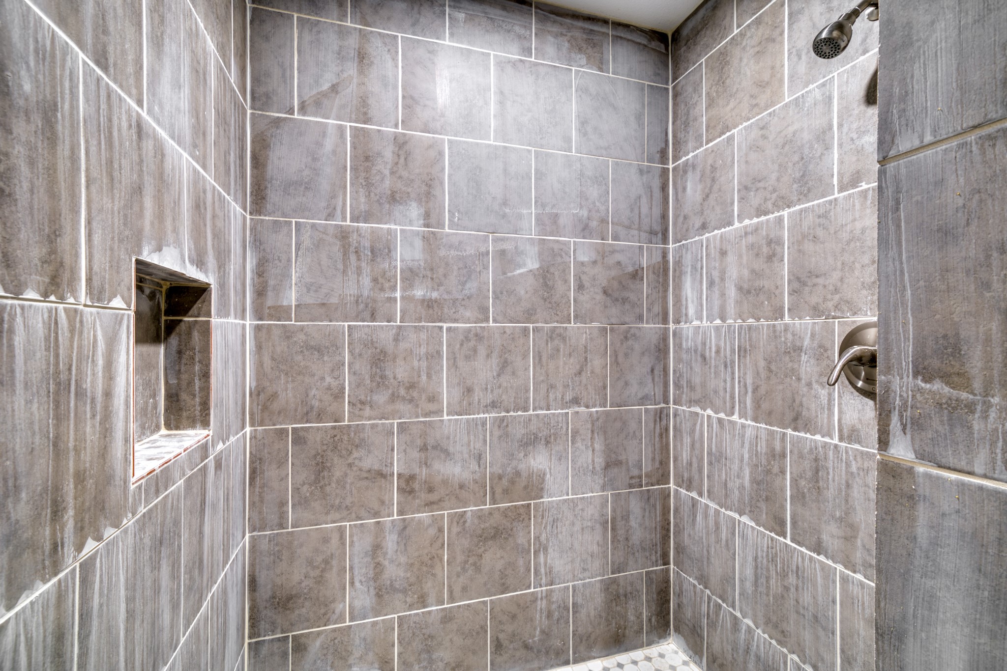 9337 Ash Street Midway, TX 75852 - Photo 14 of 28 a bathroom with a bathtub and shower