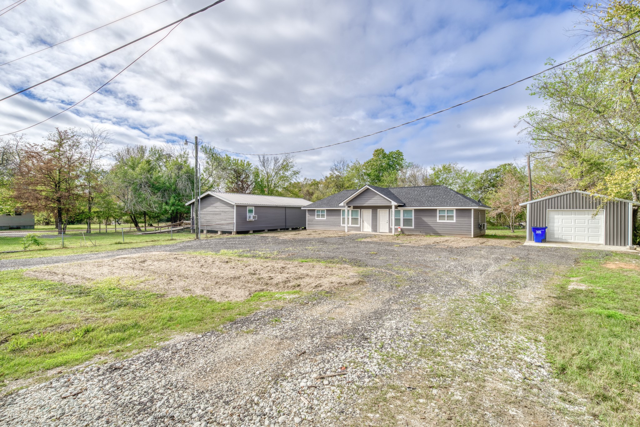 9337 Ash Street Midway, TX 75852 - Photo 17 of 28 a view of a house with a yard