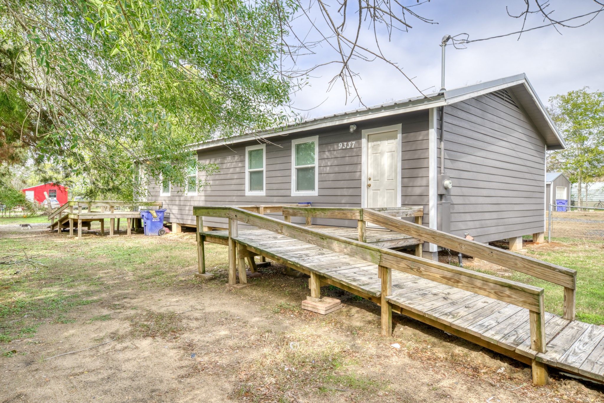 9337 Ash Street Midway, TX 75852 - Photo 24 of 28 a backyard of a house with table and chairs
