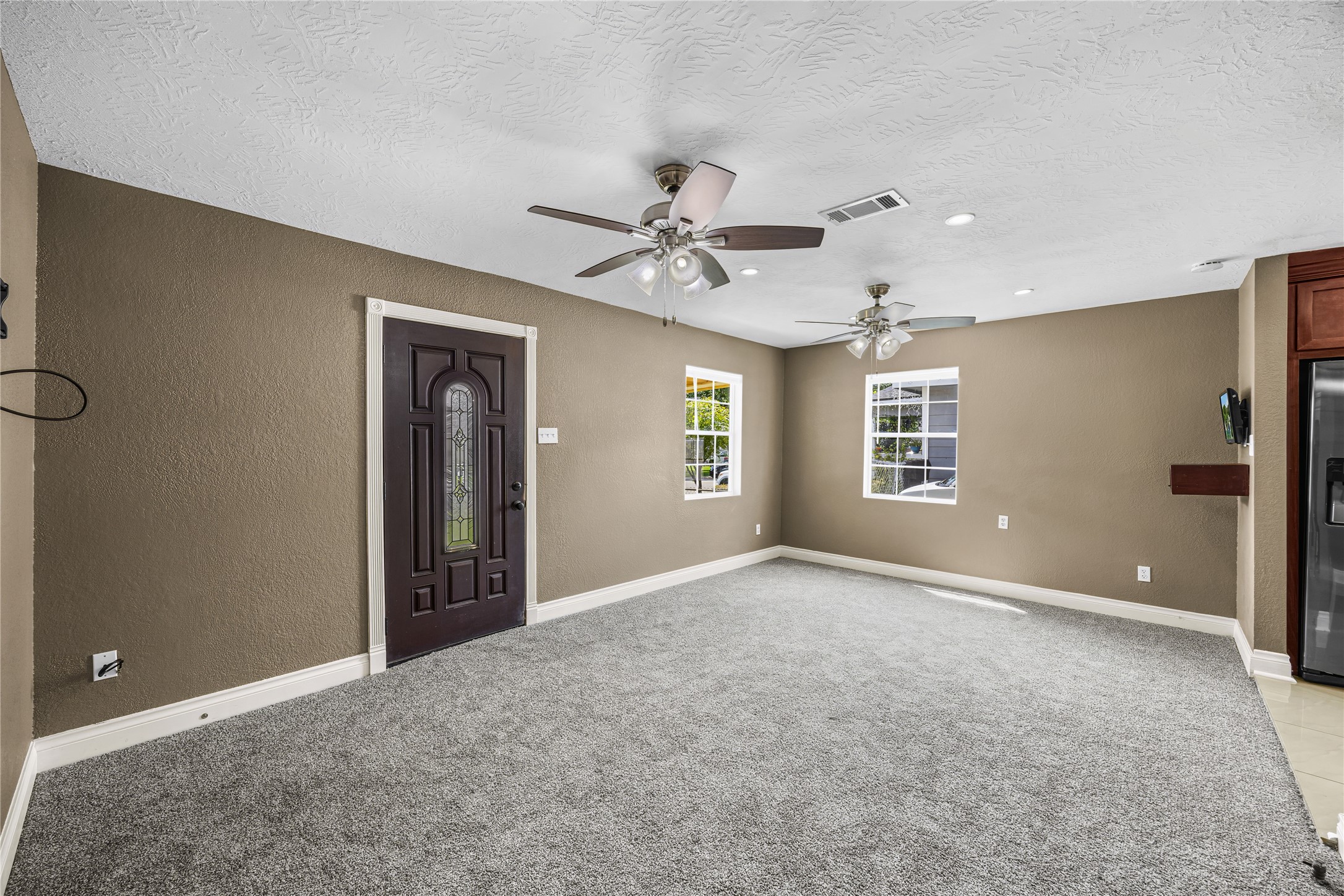 10221 Flaxman Street Houston, TX 77029 - Photo 13 of 20 a view of an empty room with a window