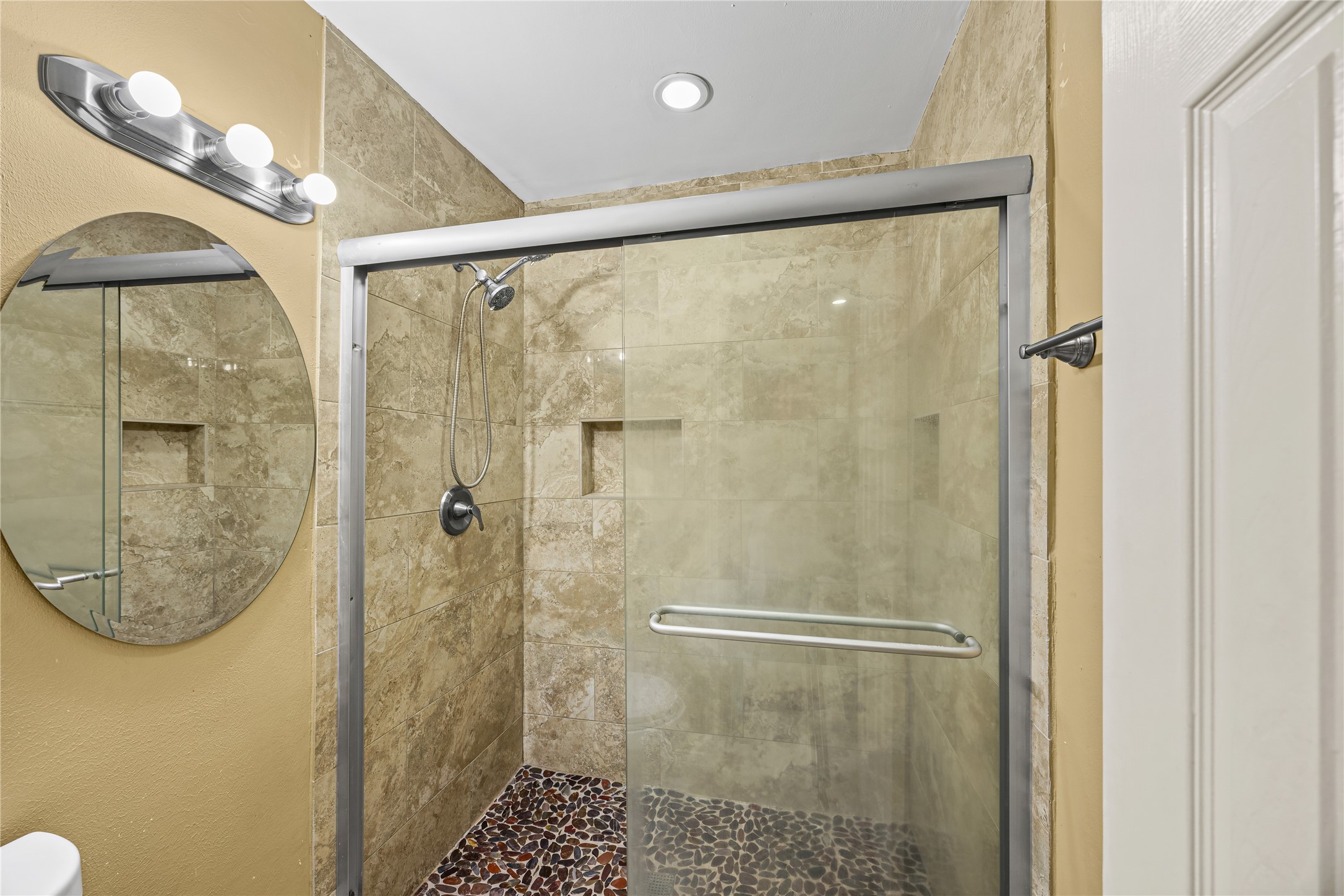 10221 Flaxman Street Houston, TX 77029 - Photo 16 of 20 a bathroom with a shower