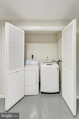 a view of a backyard with plants and garden