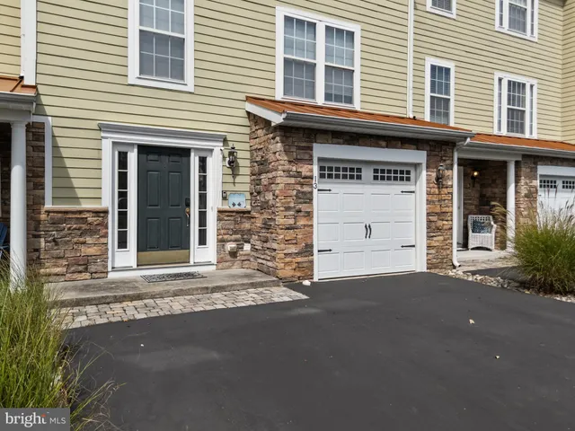 a view of a house with a garage