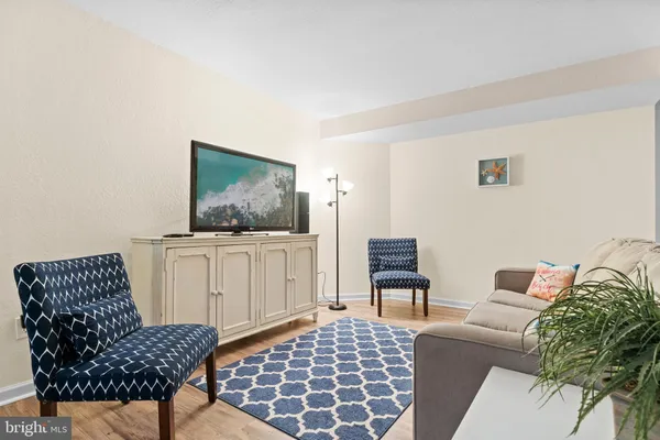 a living room with furniture and a couch