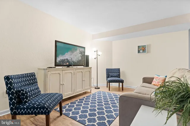 a living room with furniture and a couch