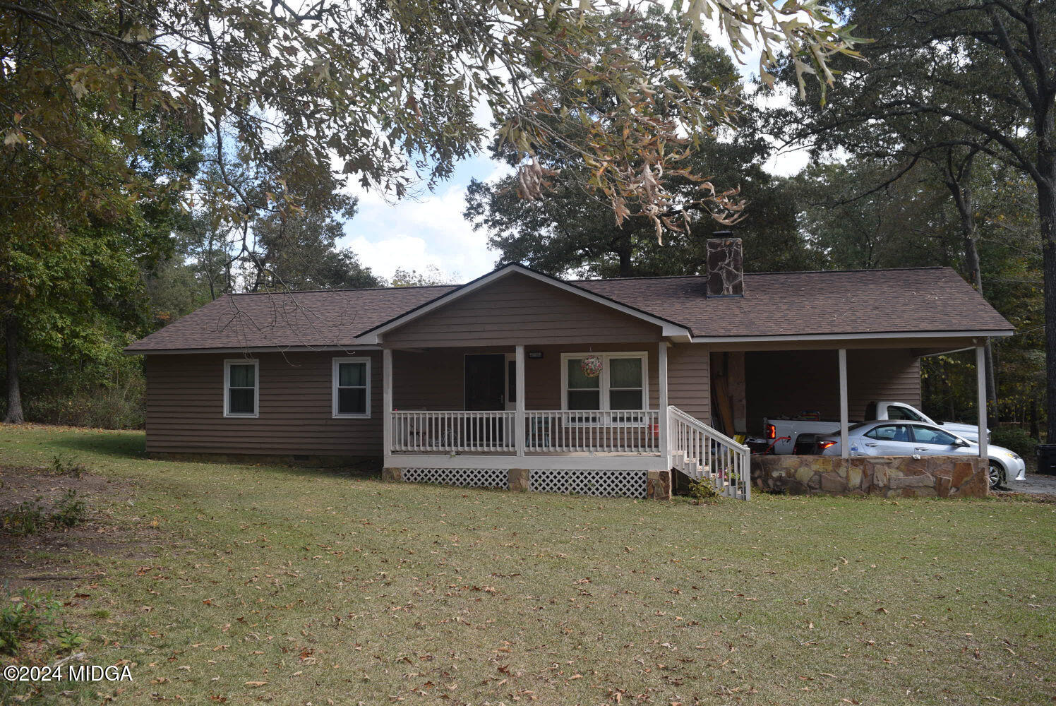 891 Walker Road Byron, GA 31008 - Photo 22 of 24 front view of a house with an outdoor space