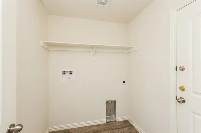 a view of small space with racks on the wall