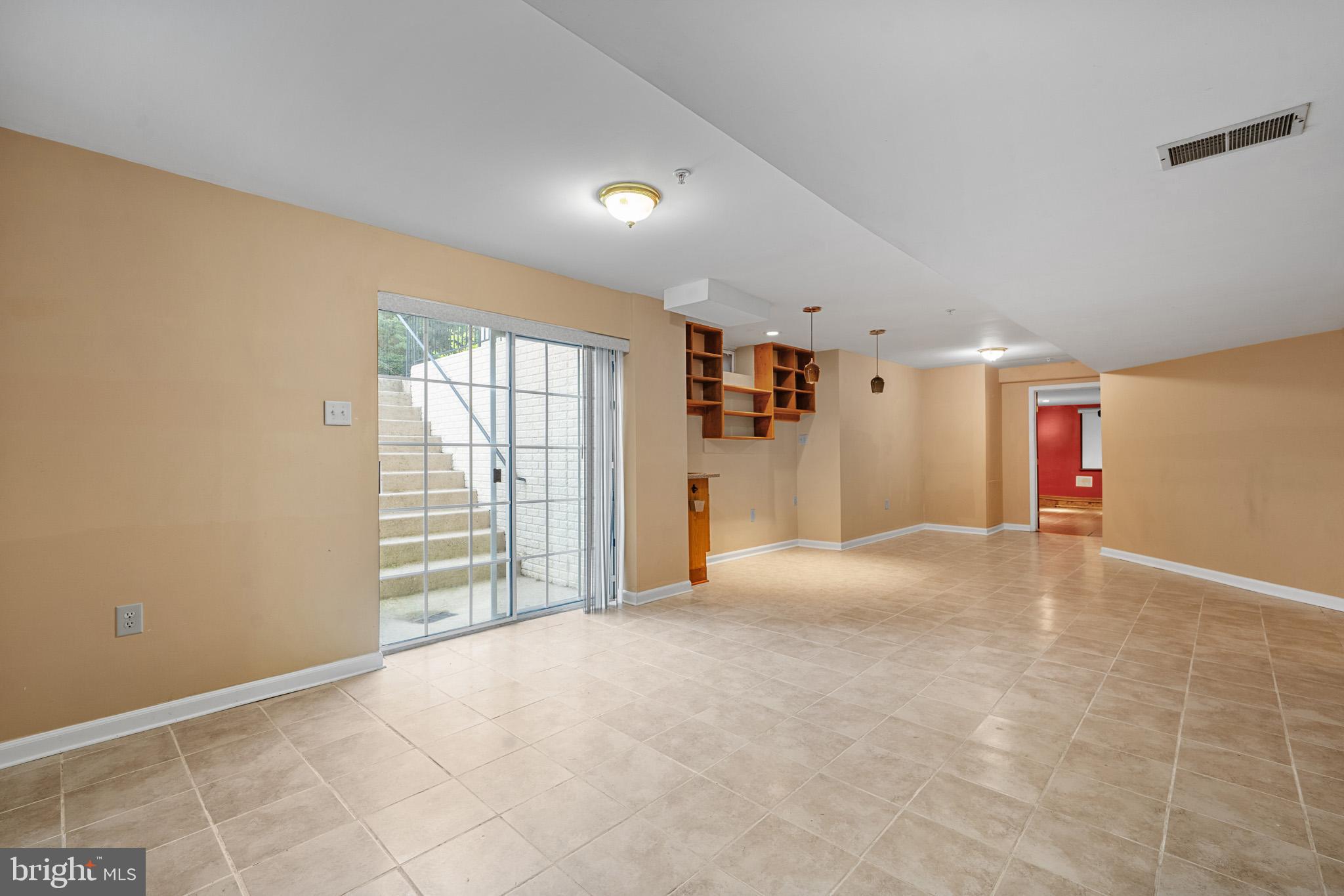 6514 Manton Way Lanham, MD 20706 - Photo 19 of 24 a view of an empty room with a window