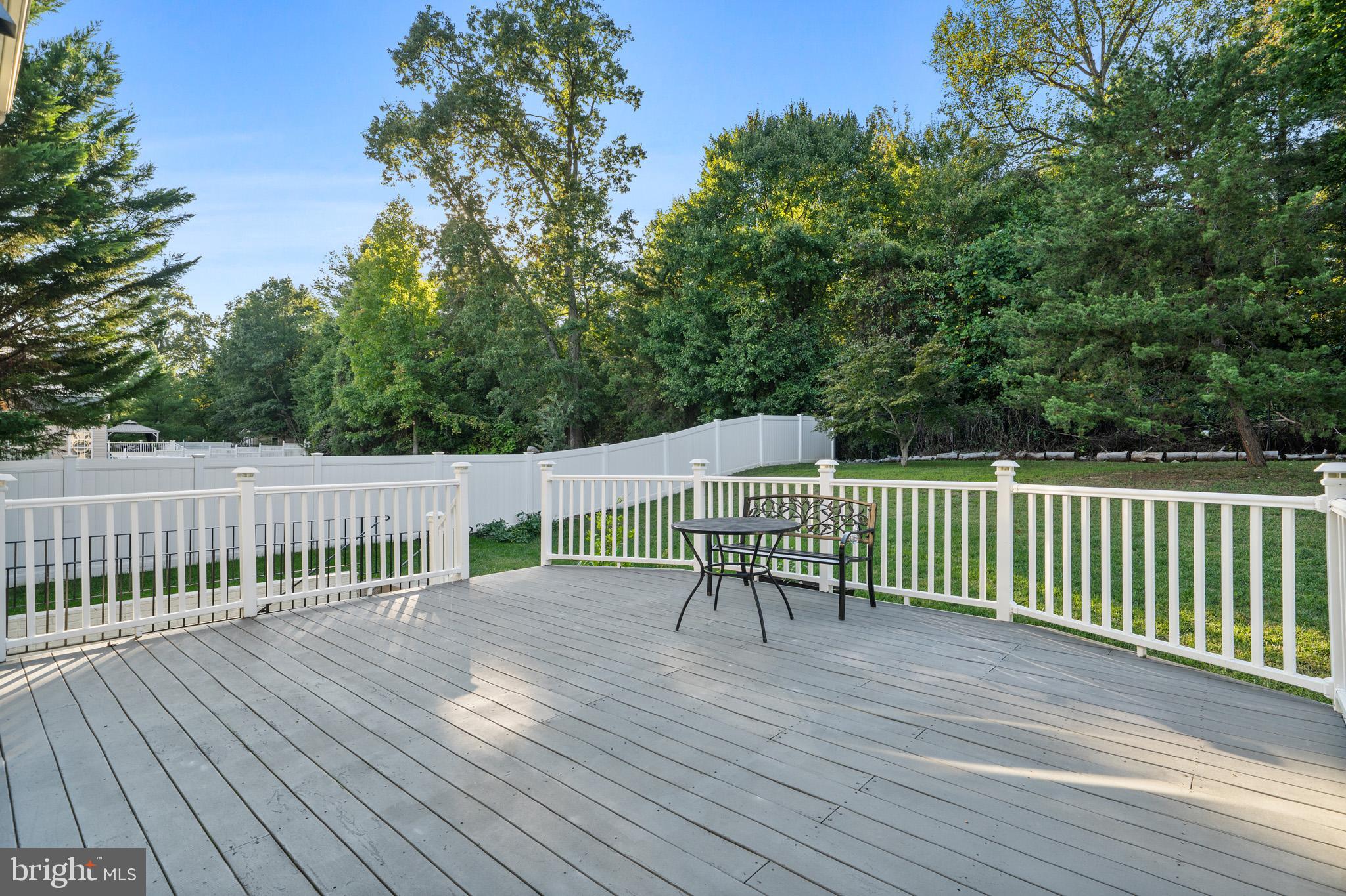 6514 Manton Way Lanham, MD 20706 - Photo 21 of 24 a view of a deck with wooden floor and fence
