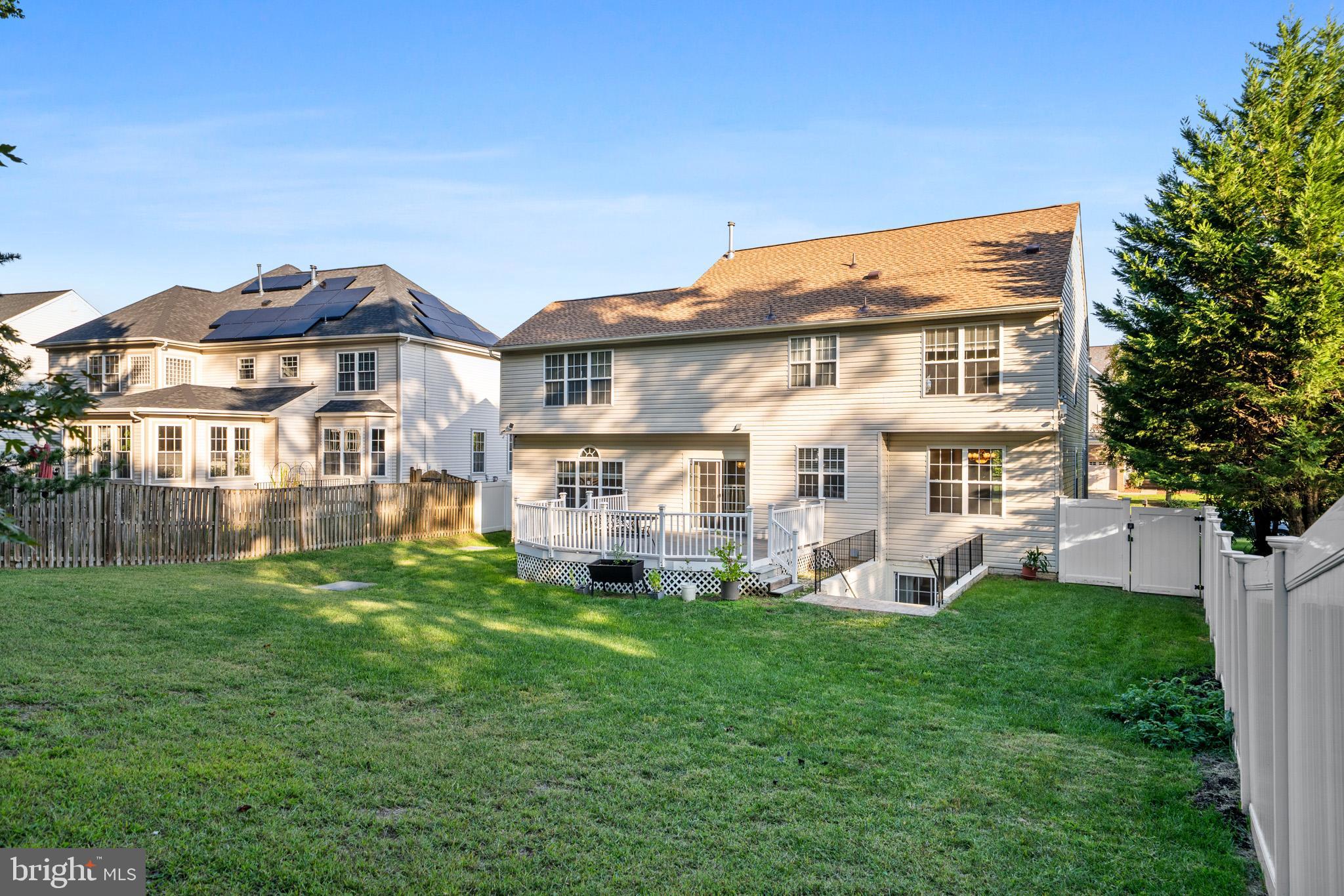 6514 Manton Way Lanham, MD 20706 - Photo 23 of 24 a view of a house with a yard and sitting area