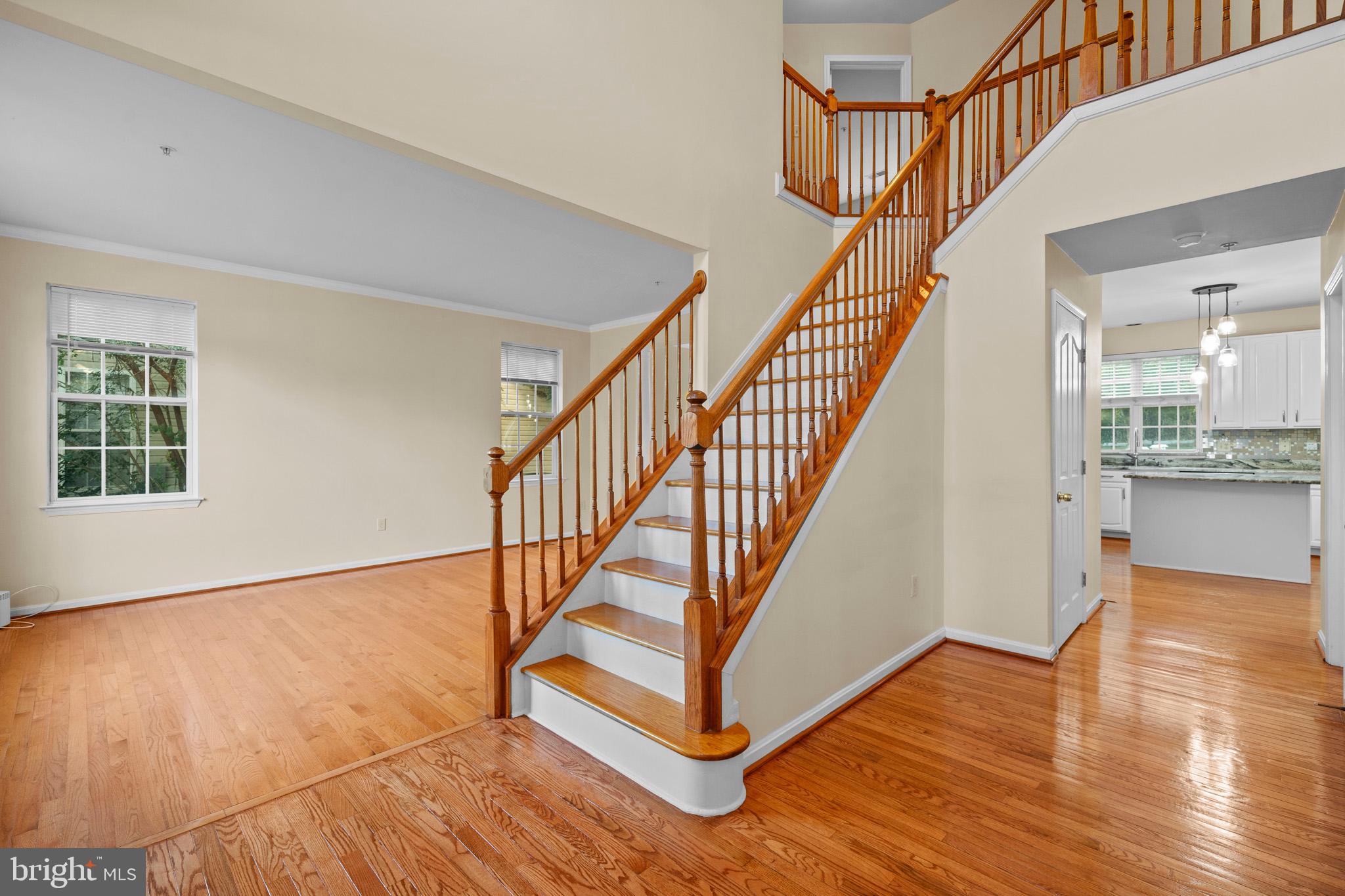 6514 Manton Way Lanham, MD 20706 - Photo 4 of 24 a view of entryway and hall with wooden floor