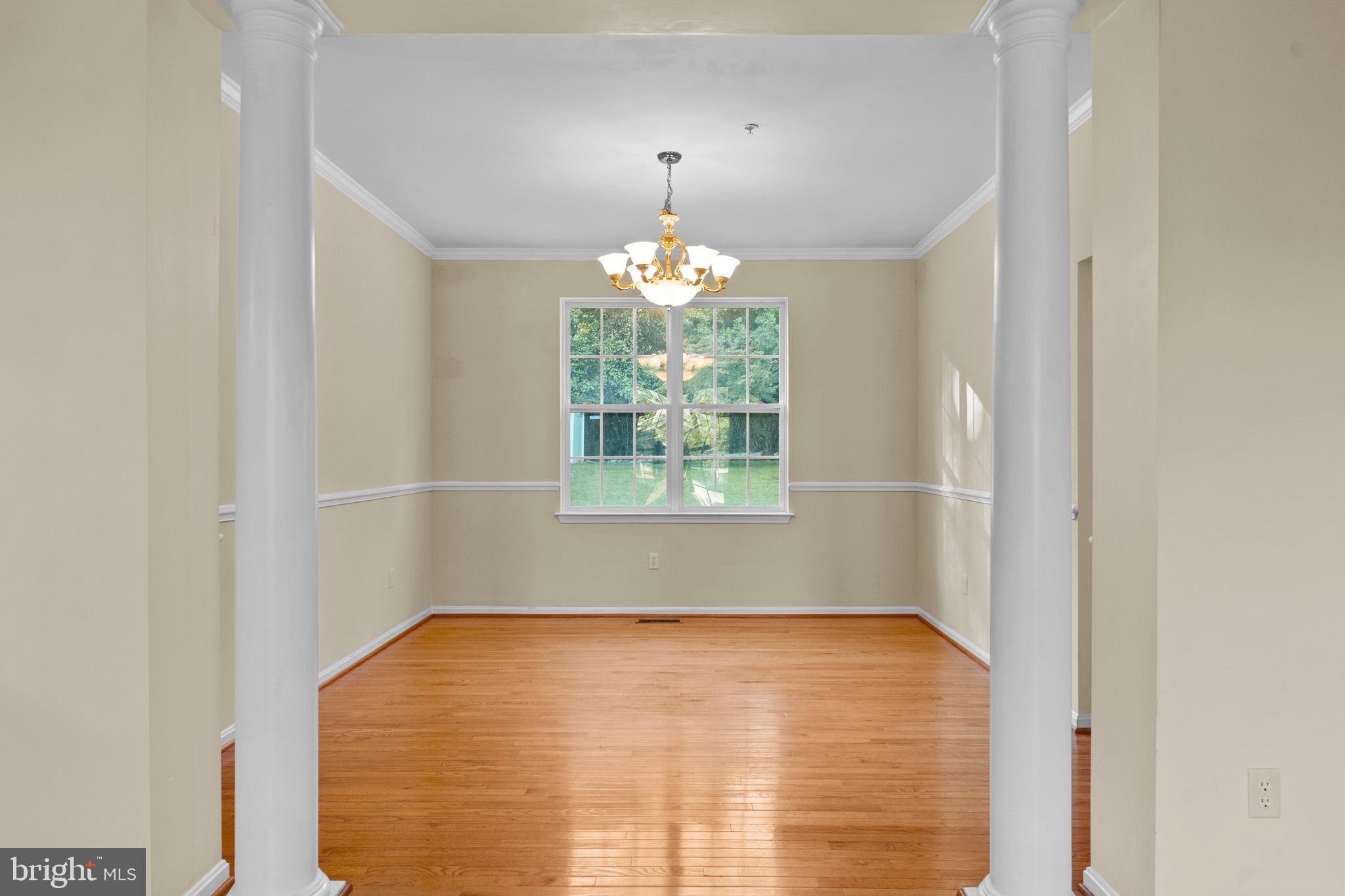 6514 Manton Way Lanham, MD 20706 - Photo 7 of 24 a view of an empty room with a window