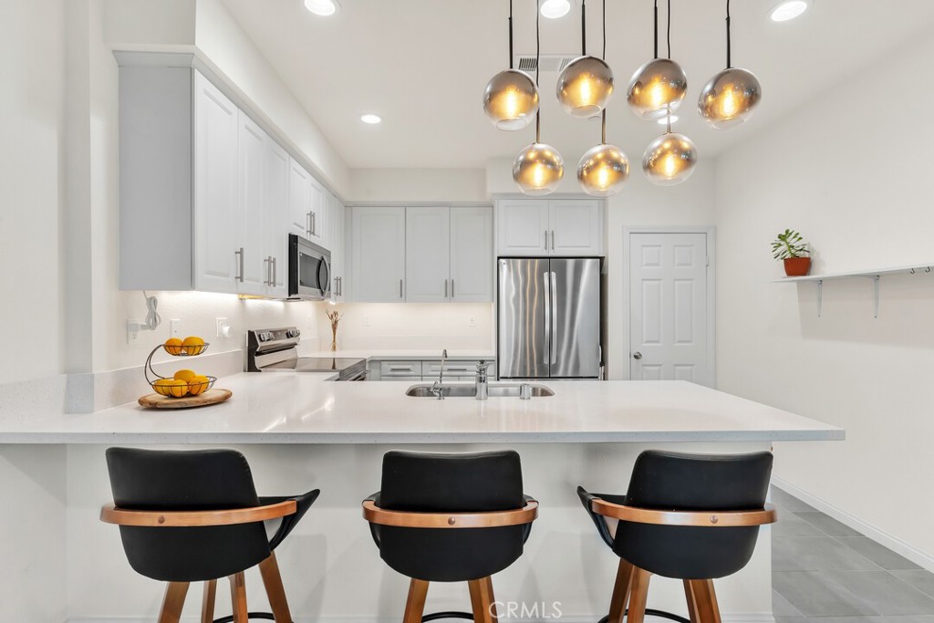 2814 Clary Street Spring Valley, CA 91977 - Photo 13 of 35 a view of kitchen and dining area with furniture