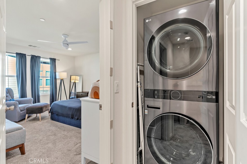 2814 Clary Street Spring Valley, CA 91977 - Photo 23 of 35 a living room with furniture and a large mirror