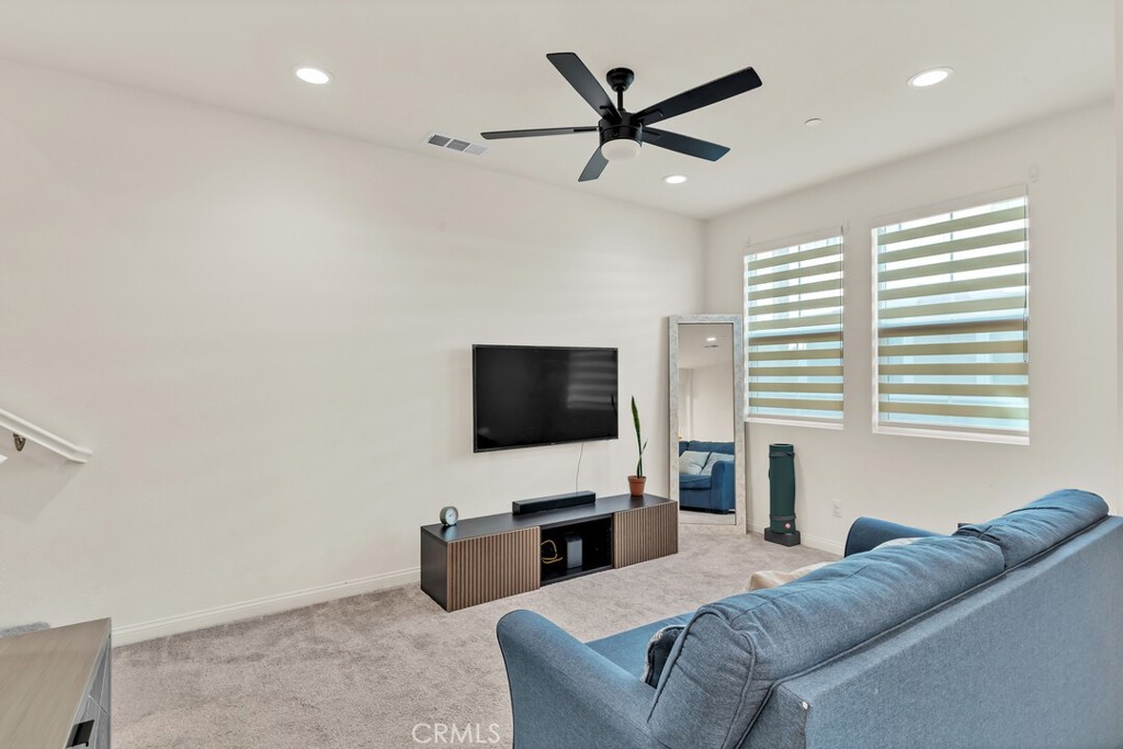 2814 Clary Street Spring Valley, CA 91977 - Photo 7 of 35 a living room with furniture and a flat screen tv