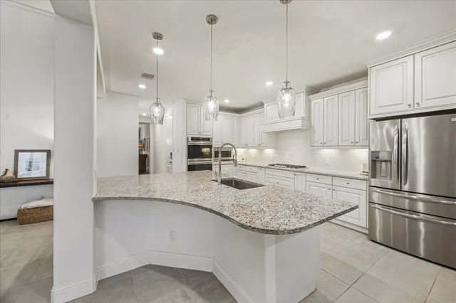 $775,000 | 1004 Ivy Meadow Lane, Pinehurst, TX 77362