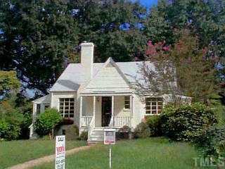 2830 Mayview Road Raleigh, NC 27607 - Photo 1 of 1 a front view of a house with a garden and plants