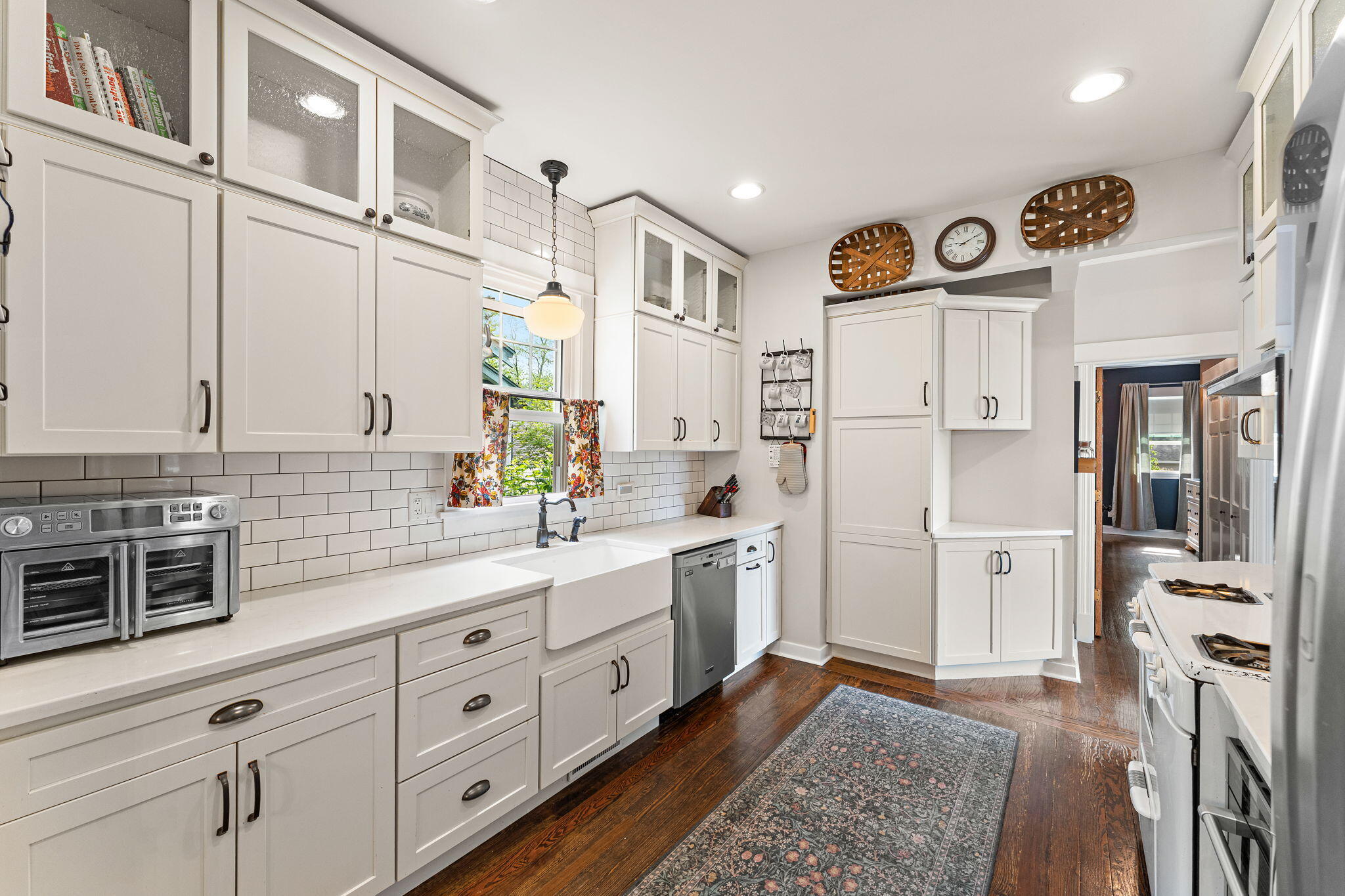 504 South Court Street Crown Point, IN 46307 - Photo 6 of 61 a kitchen with stainless steel appliances a refrigerator sink and cabinets
