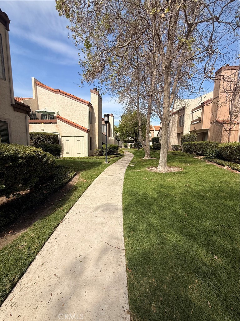 1766 Sinaloa Road, Unit 177 Simi Valley, CA 93065 - Photo 12 of 13 a view of a house with a yard