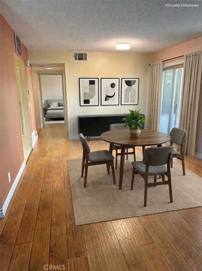 1766 Sinaloa Road, Unit 177 Simi Valley, CA 93065 - Photo 2 of 13 a view of a dining room with furniture and window