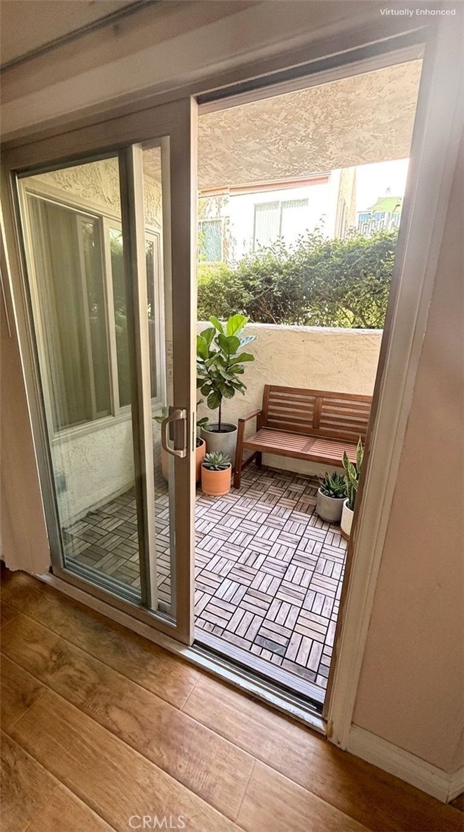 1766 Sinaloa Road, Unit 177 Simi Valley, CA 93065 - Photo 4 of 13 a view of living room and wooden floor