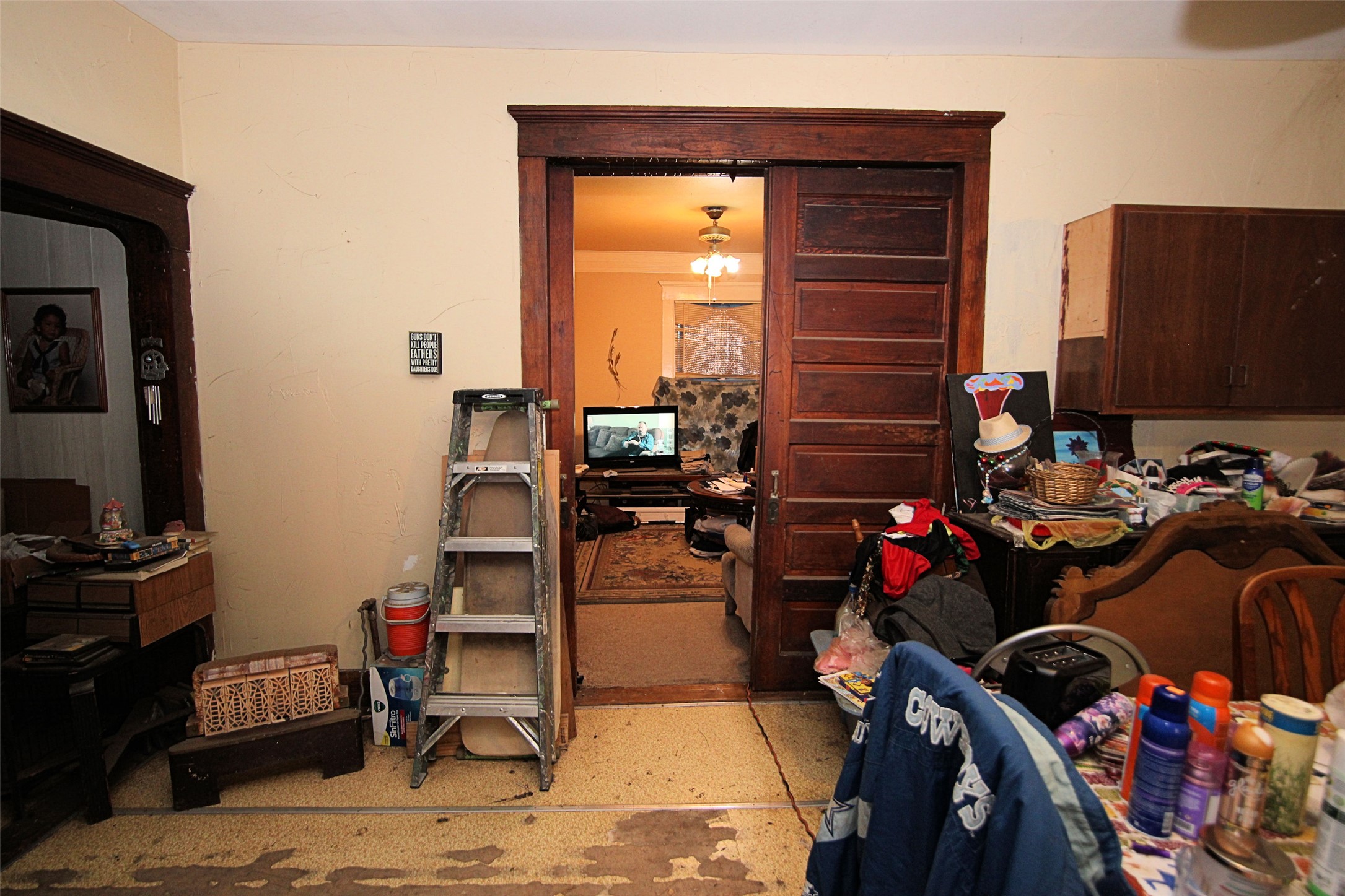 402 Trinity Street Lockhart, TX 78644 - Photo 18 of 18 Looking towards Living Room, tall ceilings, original Wood Doors