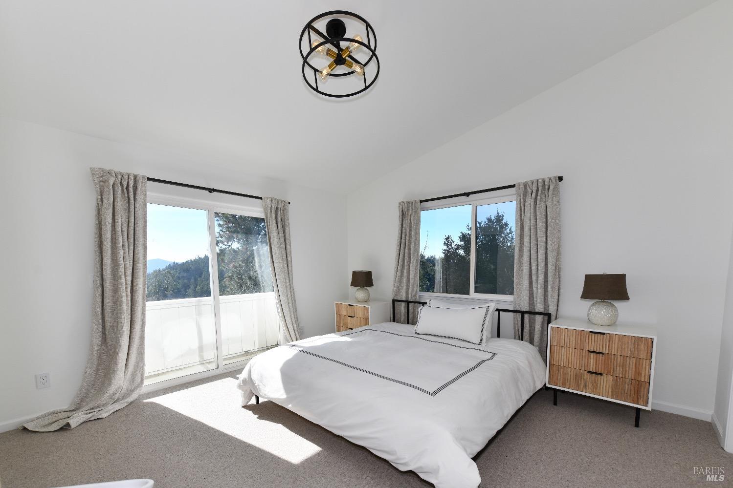 540 Edgemont Lane Angwin, CA 94508 - Photo 19 of 40 a bedroom with a bed and a window