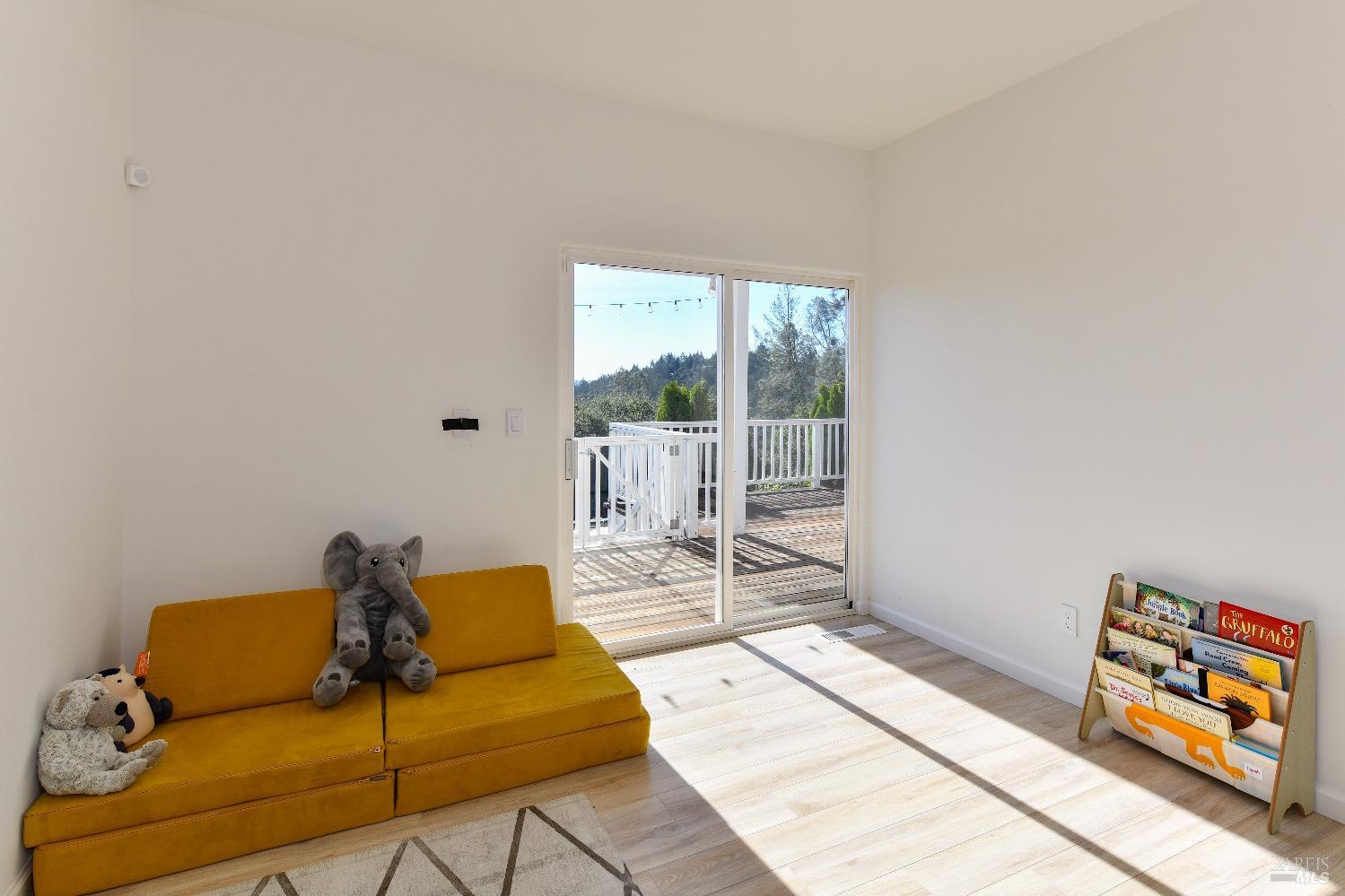 540 Edgemont Lane Angwin, CA 94508 - Photo 26 of 40 a living room with furniture and a window