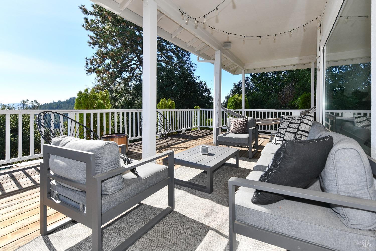 540 Edgemont Lane Angwin, CA 94508 - Photo 31 of 40 a view of a patio with couches table and chairs