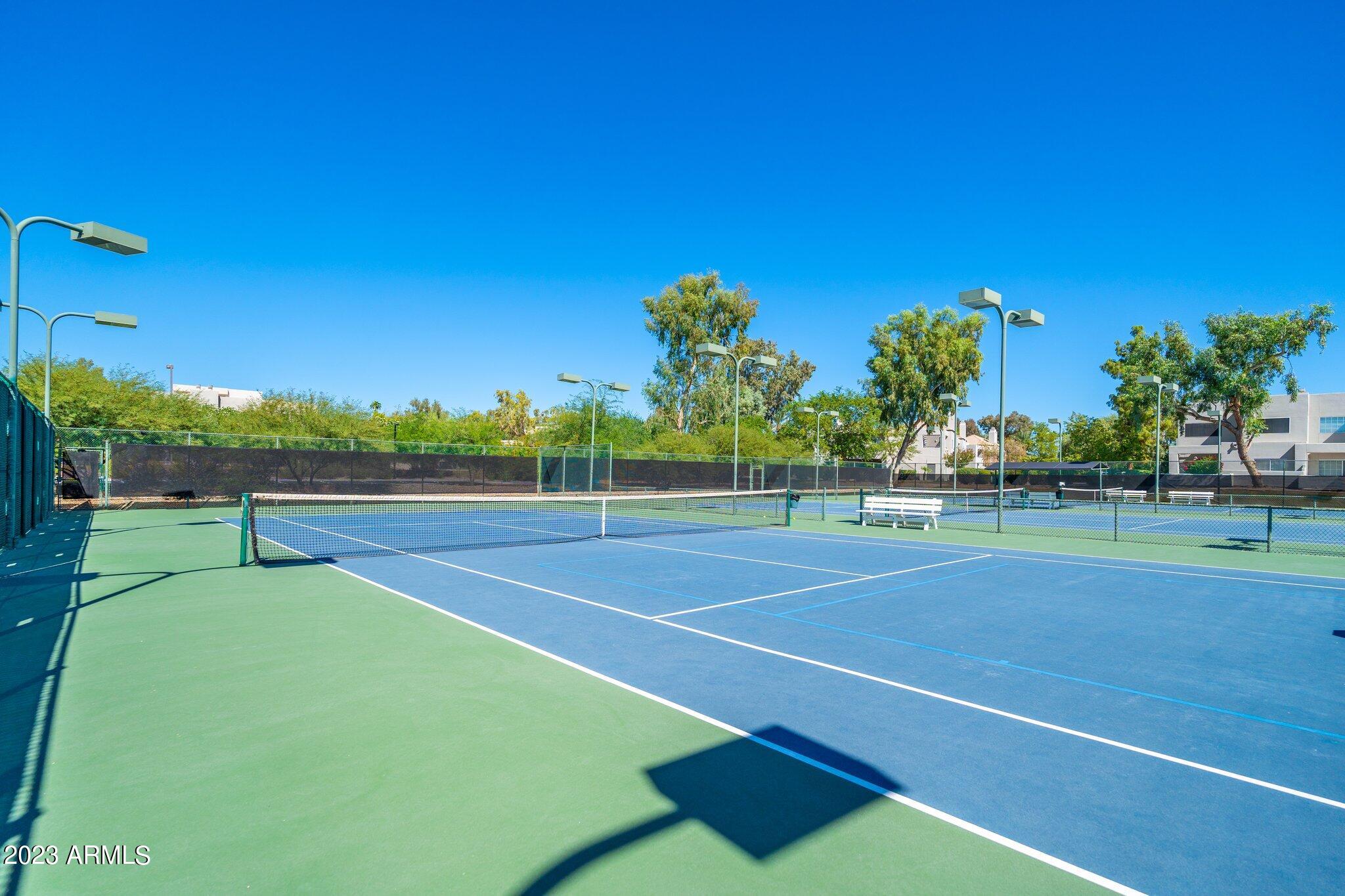 7710 East Gainey Ranch Road, Unit 259 Scottsdale, AZ 85258 - Photo 40 of 48 a view of a tennis court