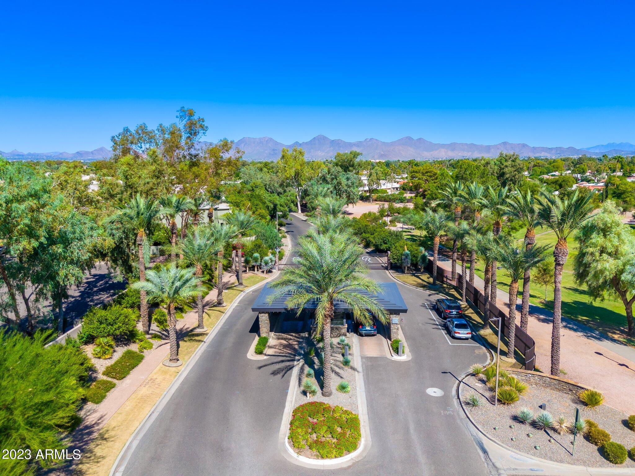 7710 East Gainey Ranch Road, Unit 259 Scottsdale, AZ 85258 - Photo 46 of 48 a view of a swimming pool with a patio