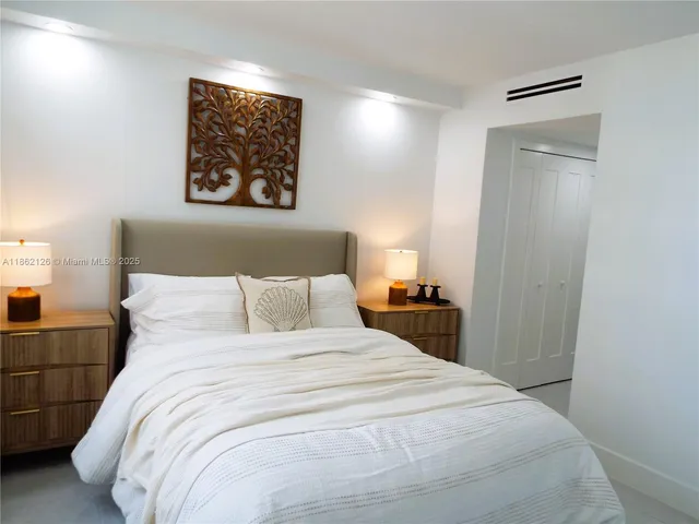 a bathroom with a sink and shower