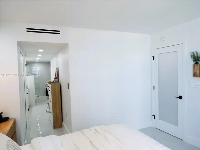 a view of an entryway with white walls