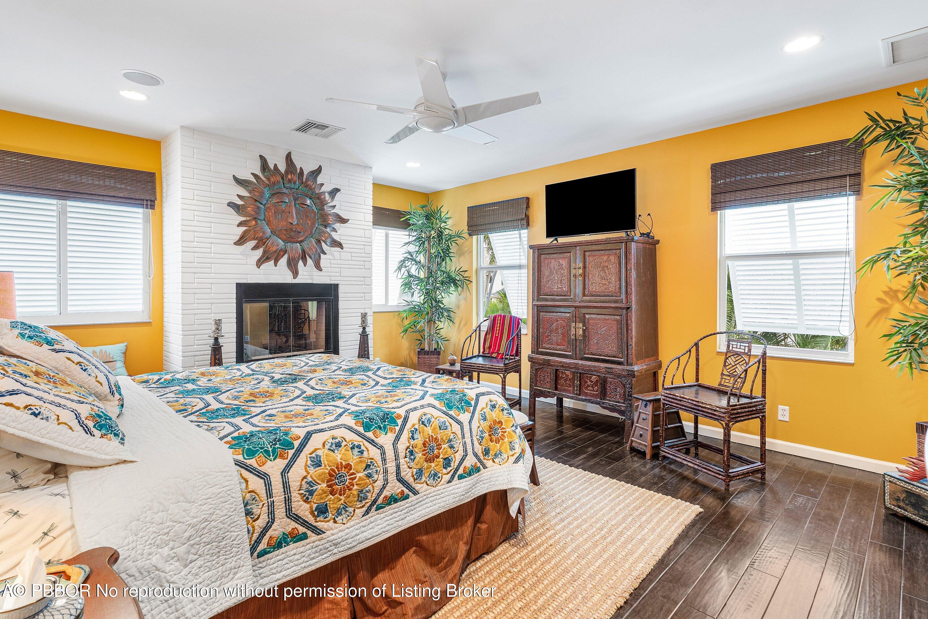 110 Dolphin Road Ocean Ridge, FL 33435 - Photo 13 of 33 a bedroom with a bed and wooden floor