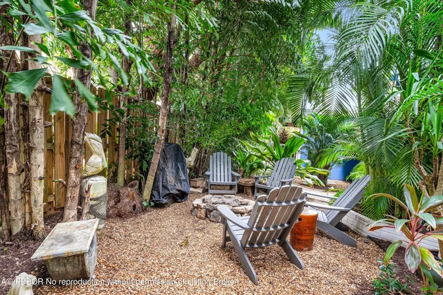 an outdoor space with lounge chair