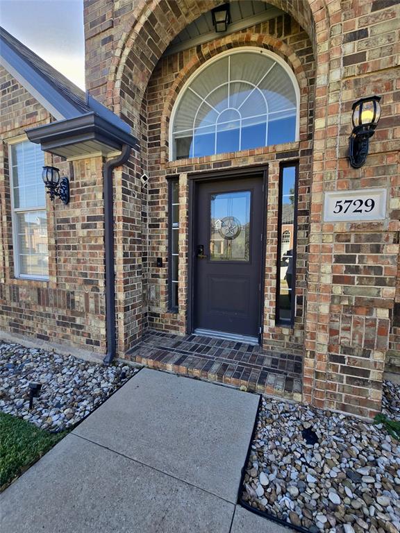 5729 Christy Lane Haltom City, TX 76137 - Photo 3 of 24 Property entrance with brick siding