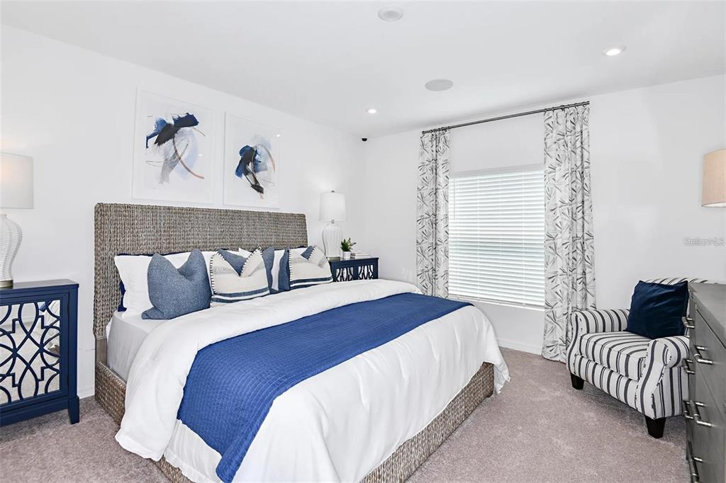 186 Jones Fish Camp Road Edgewater, FL 32141 - Photo 9 of 15 a bedroom with a bed and a window
