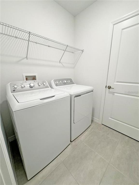186 Jones Fish Camp Road Edgewater, FL 32141 - Photo 10 of 15 a utility room with dryer and washer