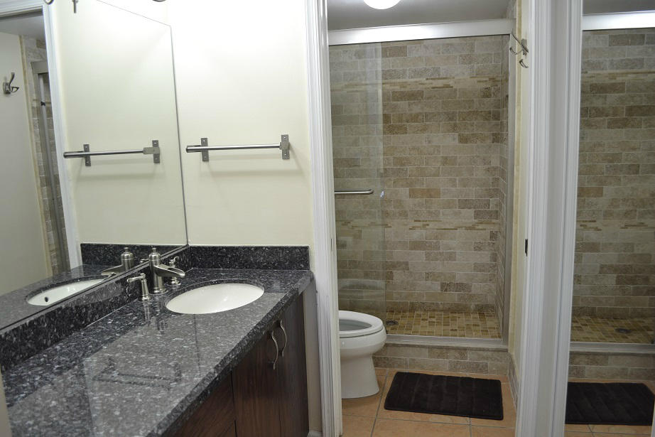 380 Northwest 67th Street, Unit J102 Boca Raton, FL 33487 - Photo 13 of 29 Master bathroom