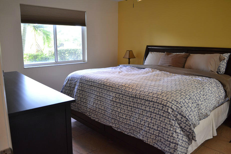 380 Northwest 67th Street, Unit J102 Boca Raton, FL 33487 - Photo 18 of 29 Master Bedroom