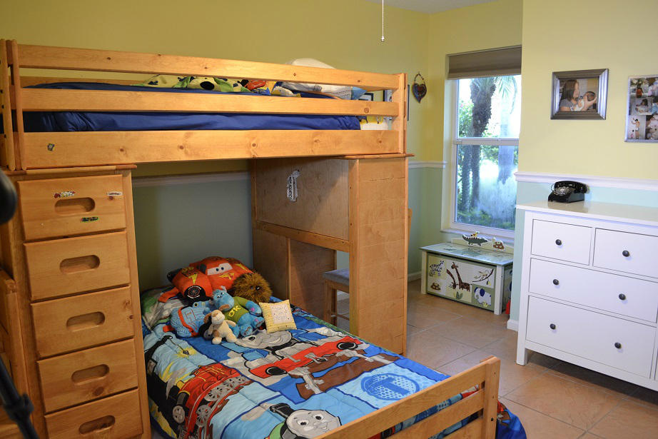 380 Northwest 67th Street, Unit J102 Boca Raton, FL 33487 - Photo 21 of 29 Guest bedroom